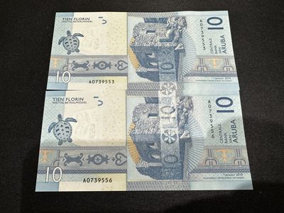 《外钞收藏家》第二百六十五期 - 2019年阿鲁巴10 接近连号两张一起 全新UNC