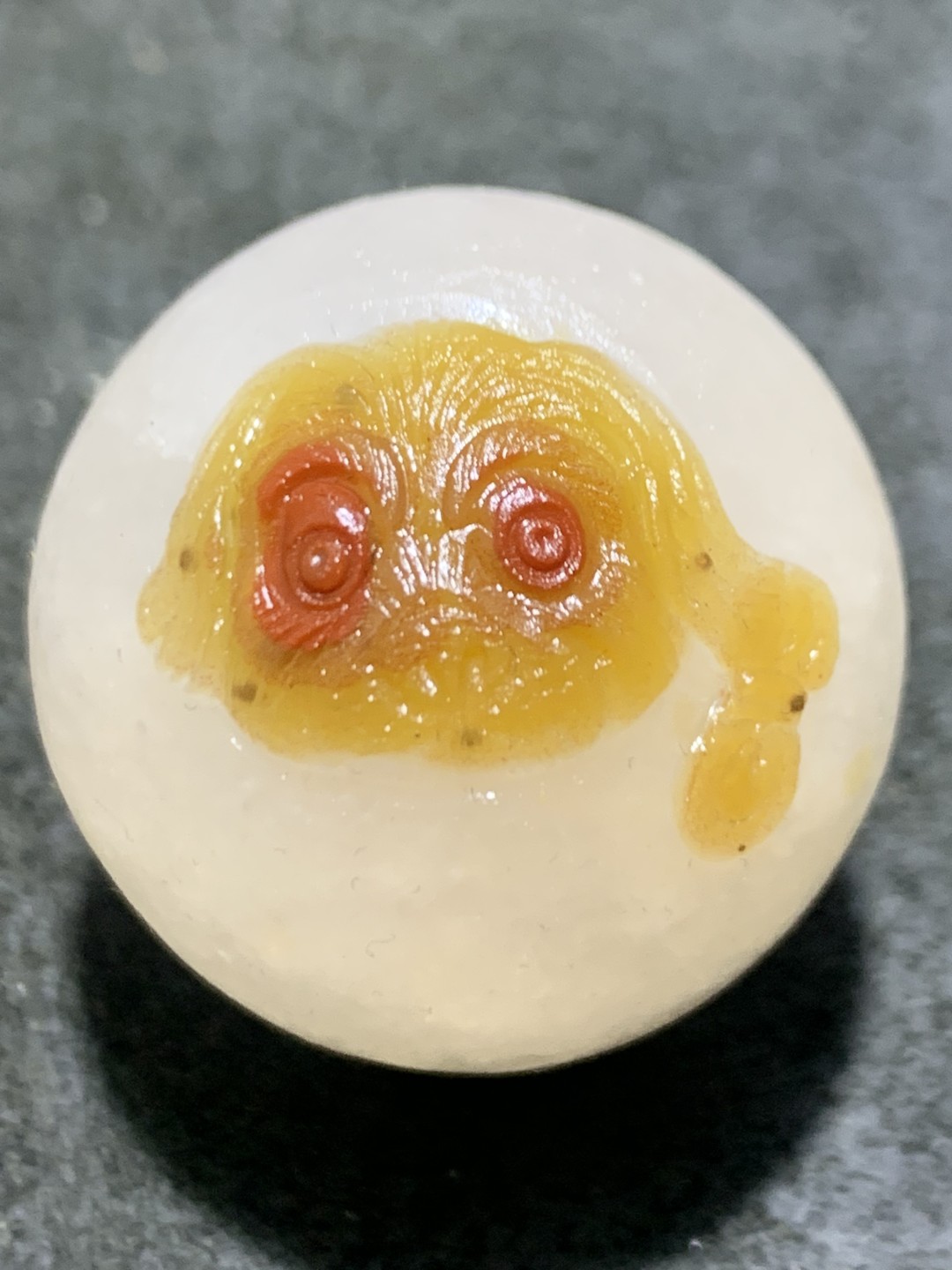 精美冰飘亚光战国红玛瑙俏色巧雕旺财圆珠一个