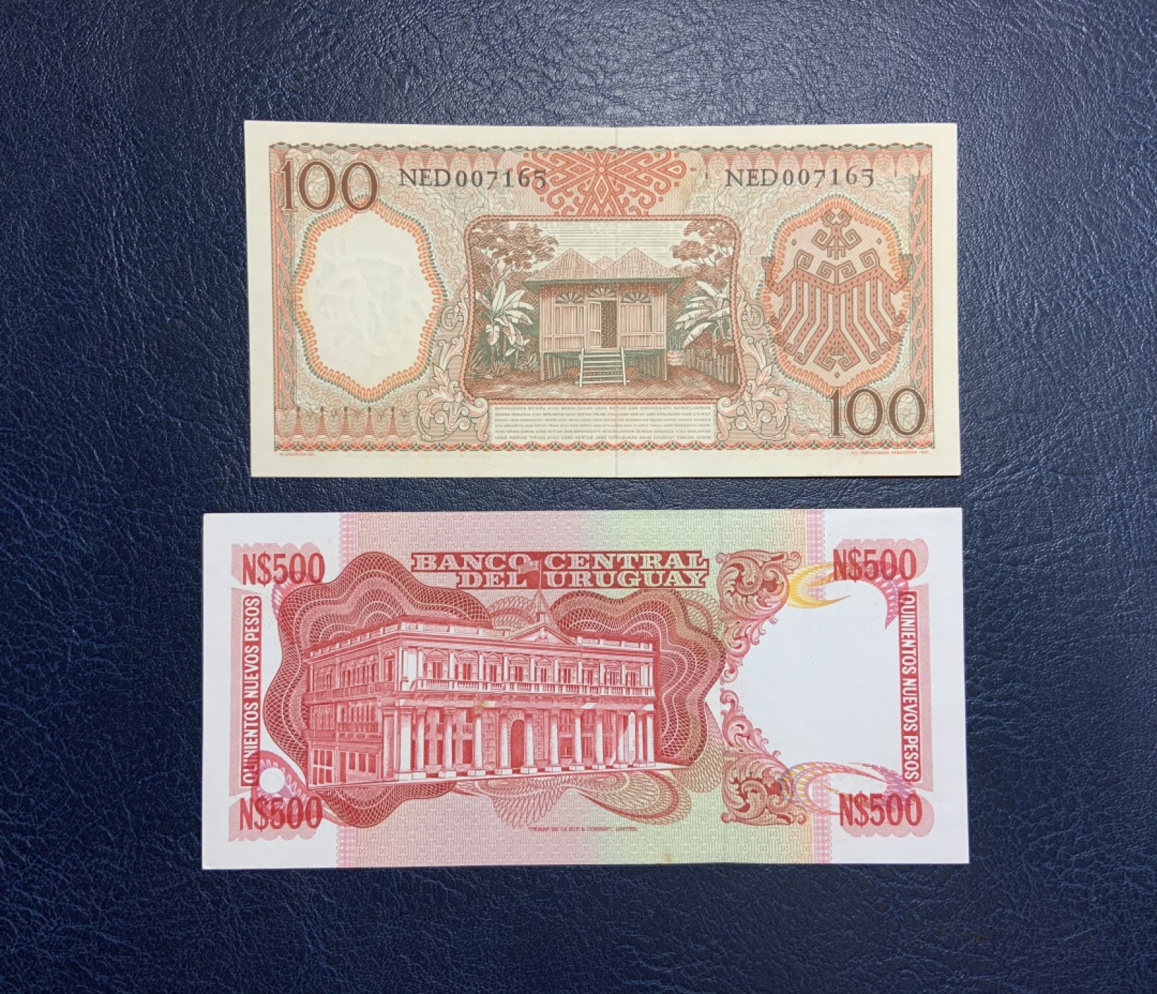 收藏联盟Quantum Auction 第255期拍卖  印度尼西亚1958年100卢比和乌拉圭1991年500比索 品相UNC 边角有瑕疵 细节如图