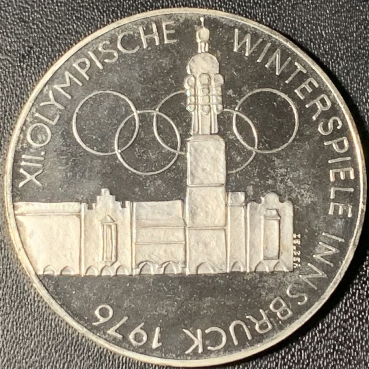 紫瑗钱币——第268期拍卖 奥地利 1976年 因斯布鲁克冬奥运 主会场 100先令 24克 0.64银 精制