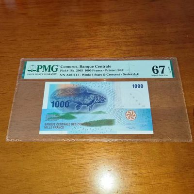 🌼甜小邱世界纸币收藏💐精品评级场🐇🌼 - PMG67 科摩罗 1000法郎 1111狮子号 无347靓号 2005 IBNS获奖钞