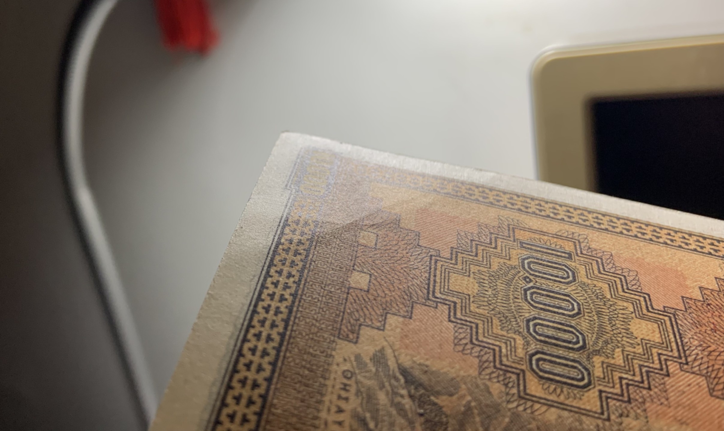 收藏联盟Quantum Auction 第256期拍卖  希腊1942年10000德拉克马 品相UNC 边角瑕疵 细节如图