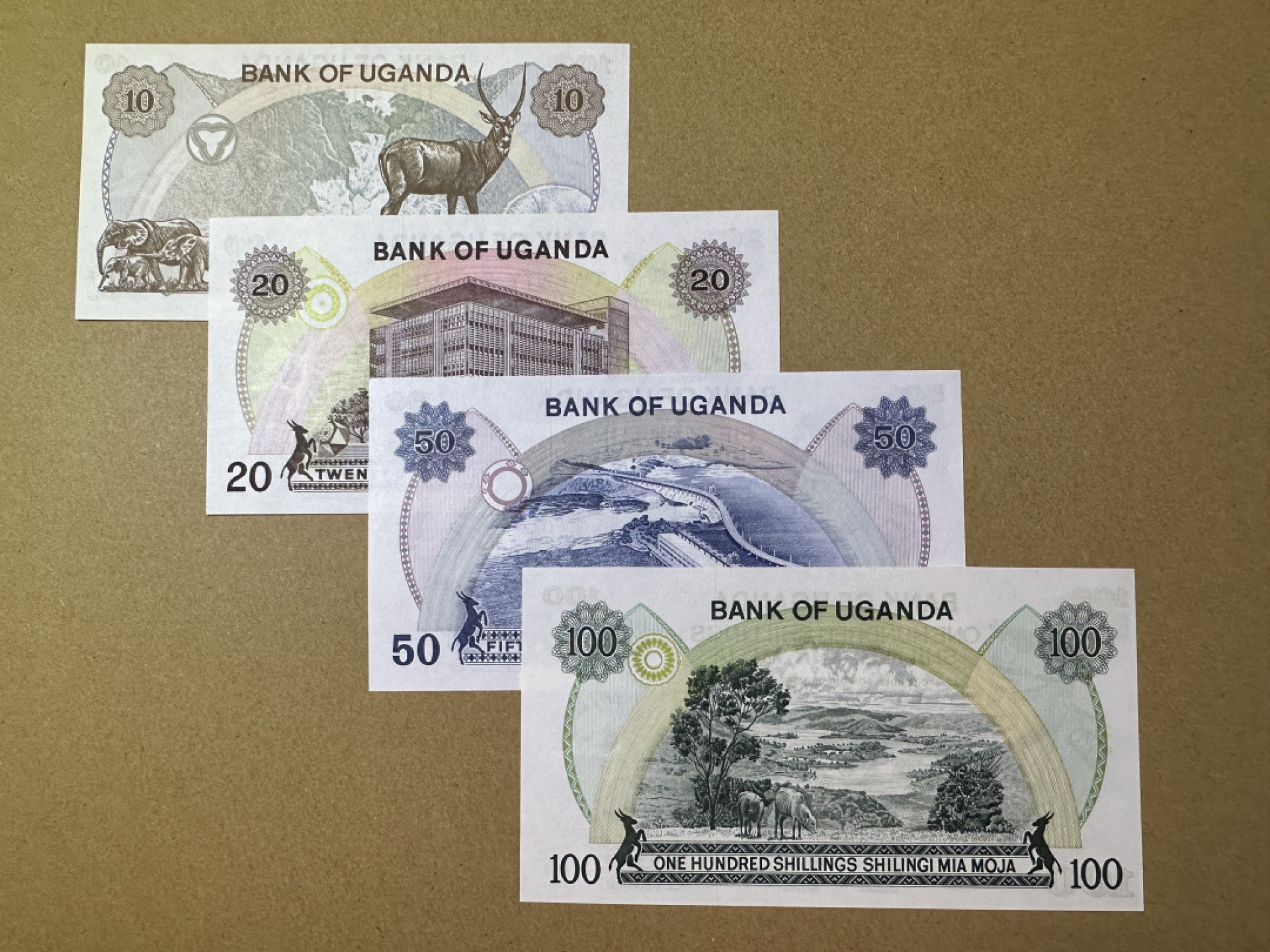 《张总收藏》99期——外币精品100拍 乌干达10、20、50、100先令4张 UNC 1973年