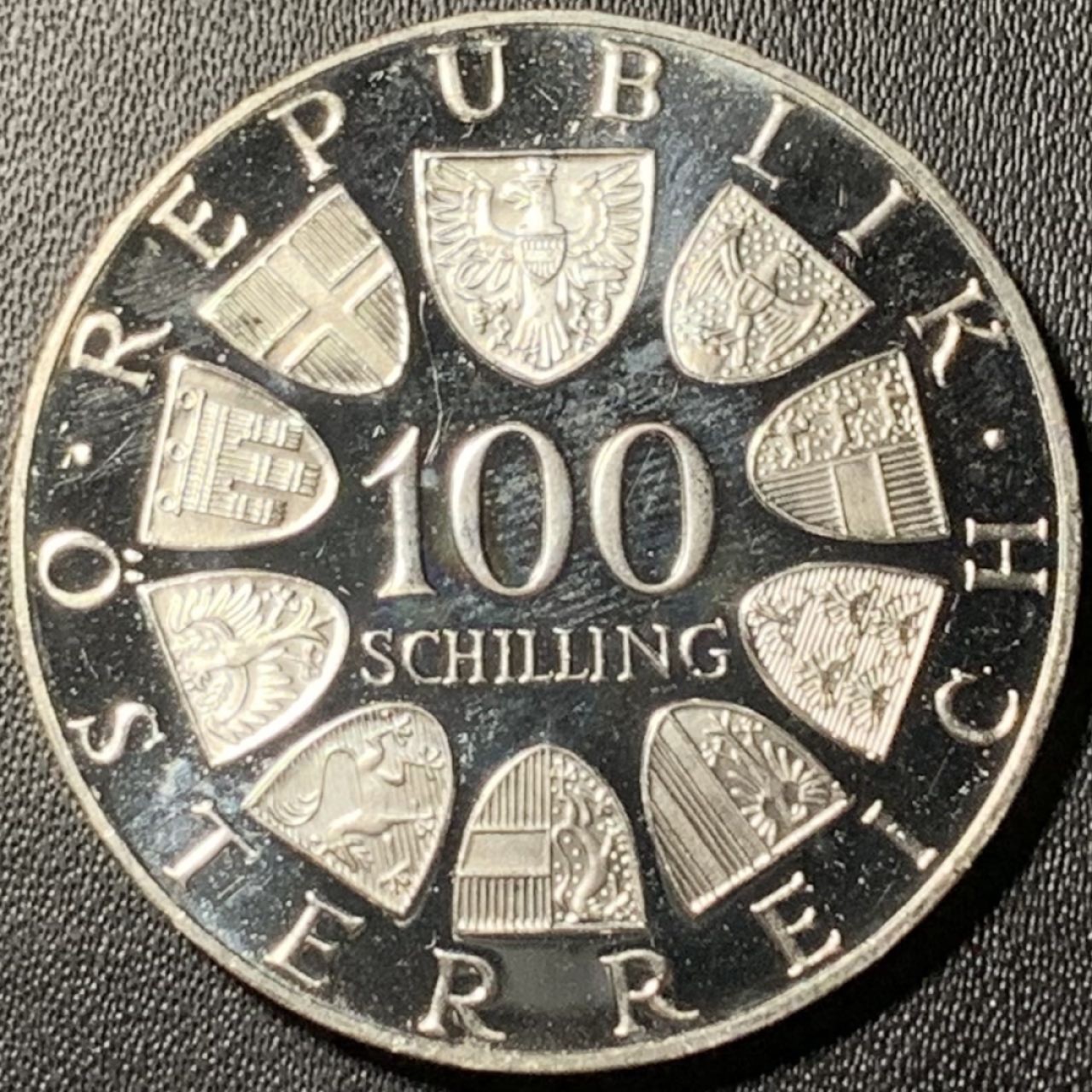 紫瑗钱币——第326期拍卖 奥地利 1976年 因斯布鲁克冬奥运 主会场 100先令 24克 0.64银 精制