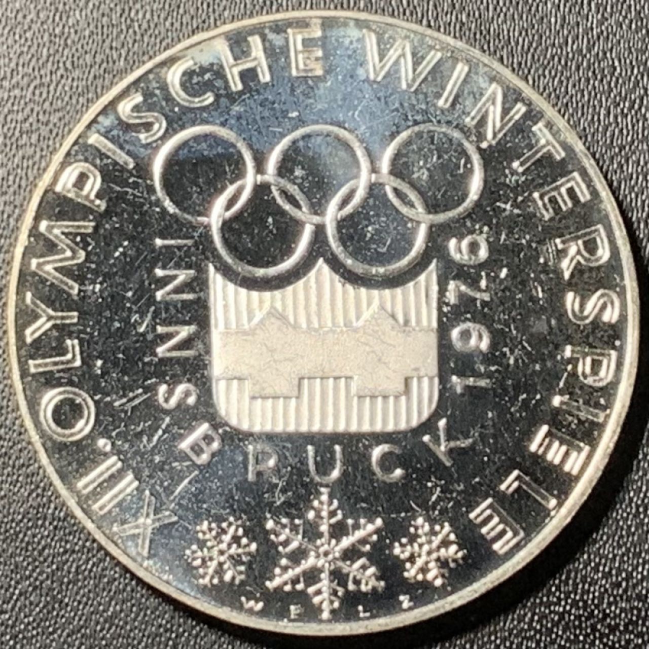 紫瑗钱币——第326期拍卖 奥地利 1976年 因斯布鲁克冬奥运 主会场 100先令 24克 0.64银 精制