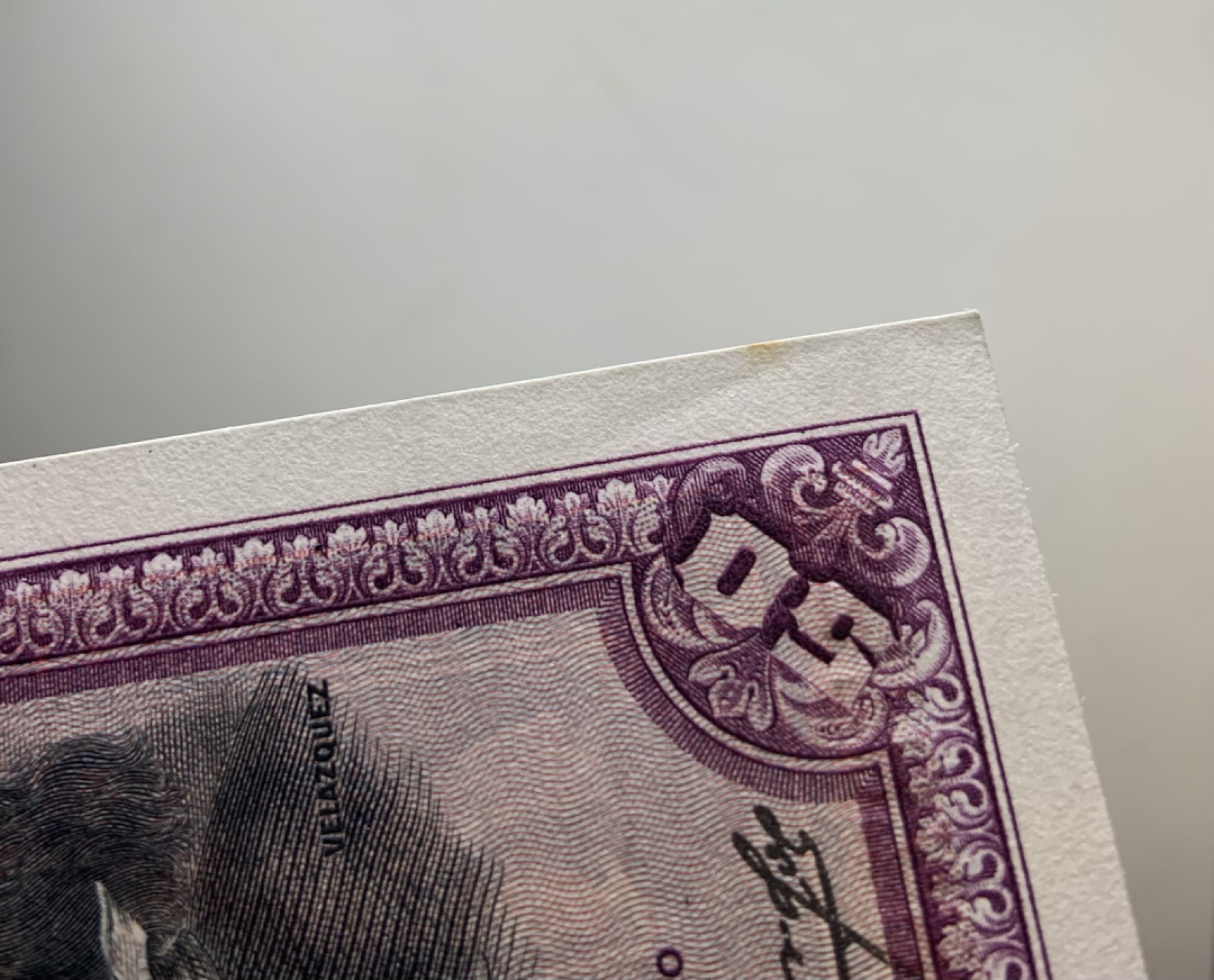 收藏联盟Quantum Auction 第257期拍卖  西班牙1928年50比塞塔 品相UNC- 点钞痕和边缘瑕疵 细节如图