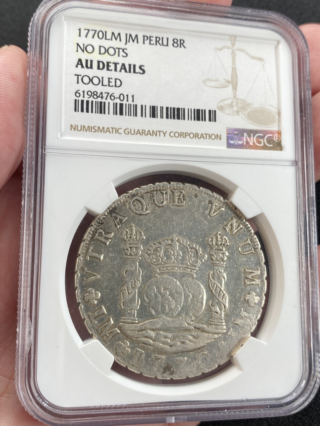 万国钱币拍卖第008期（慕尼黑2T之夜） NGC AUD 1770年西属秘鲁地球双柱8里亚尔，无点版本，非常稀少