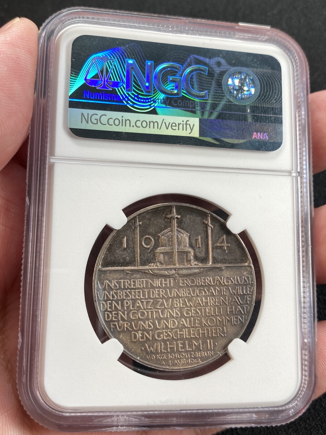 万国钱币拍卖第008期（慕尼黑2T之夜） NGC MS64 德国一战德皇威廉二世开战宣言纪念银章，镜面底板，紫色包浆难能可贵。