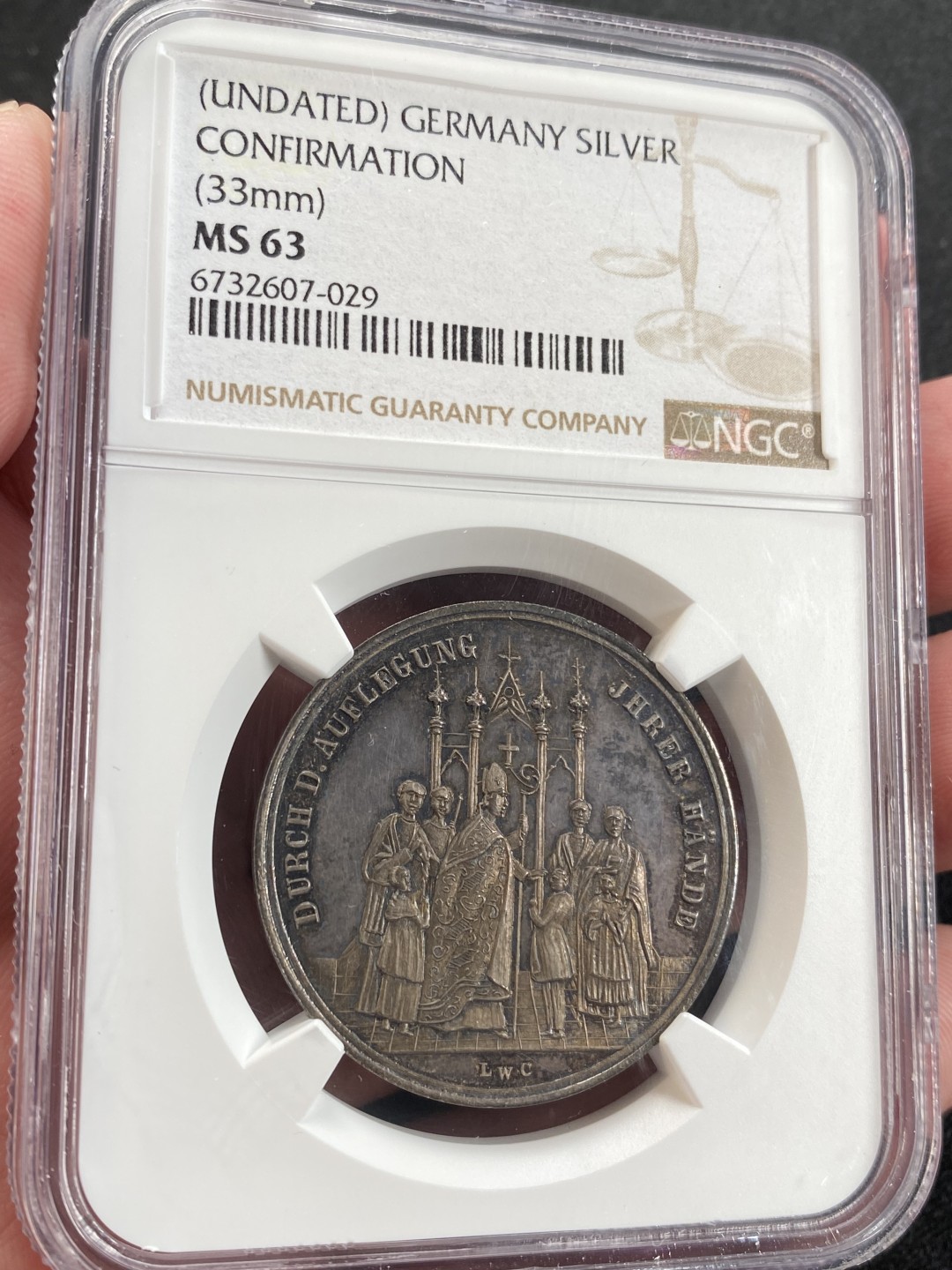 万国钱币拍卖第008期（慕尼黑2T之夜） NGC MS63 19世纪德国宗教洗礼纪念银章，镜面五彩，好品好状态。