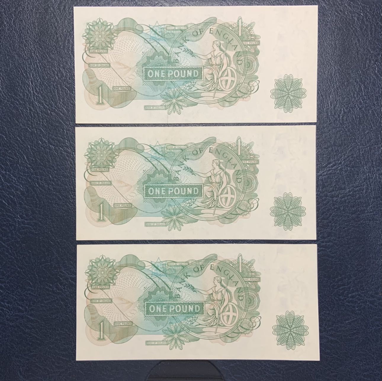 收藏联盟Quantum Auction 第257期拍卖  英国1960-70年1镑三张 品相UNC- 点钞痕