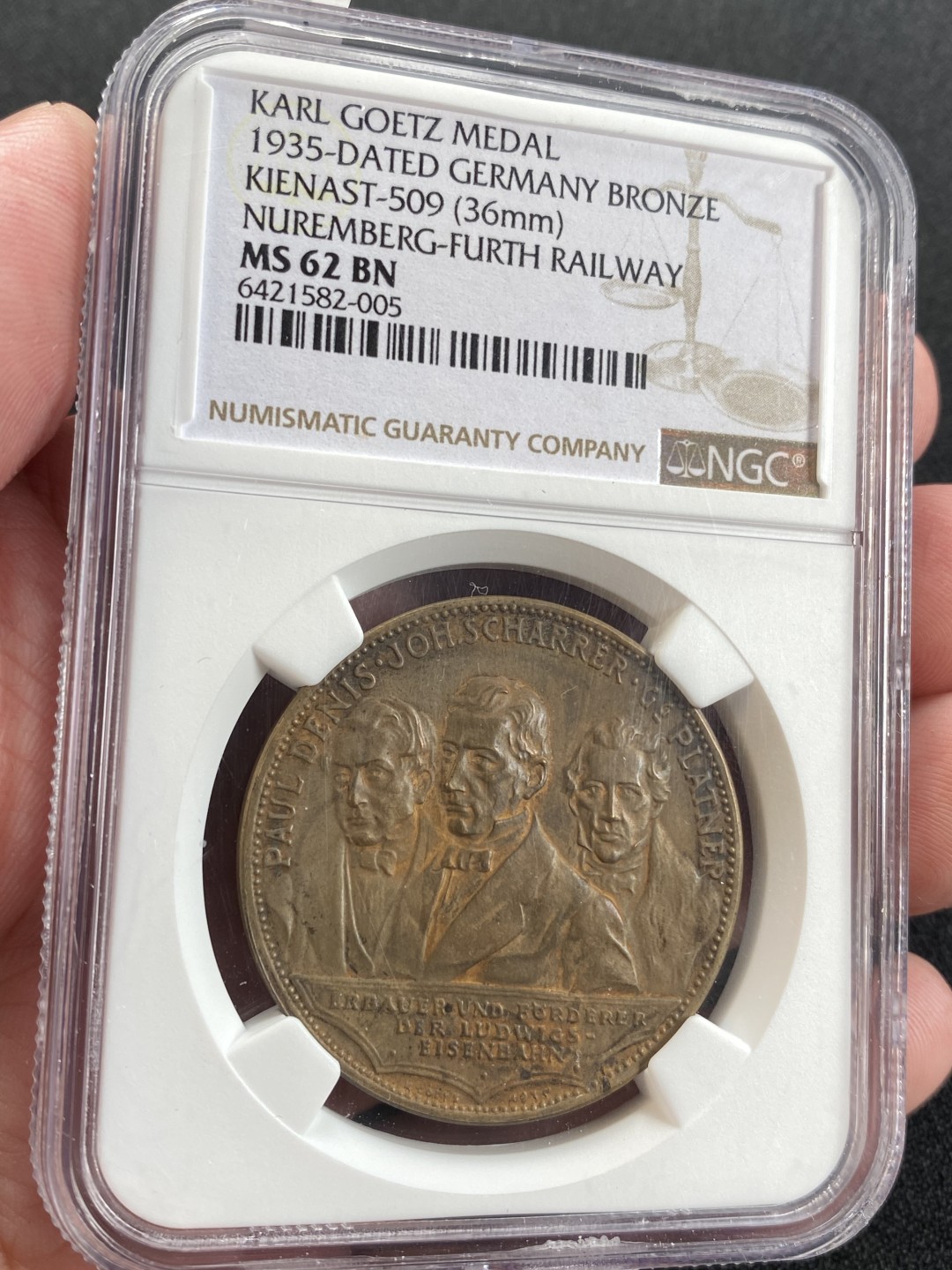 万国钱币拍卖第008期（慕尼黑2T之夜） NGC MS62 1935年德国纽伦堡-菲尔特铁路开通百年纪念铜章，卡尔哥茨作品，稀少品种。