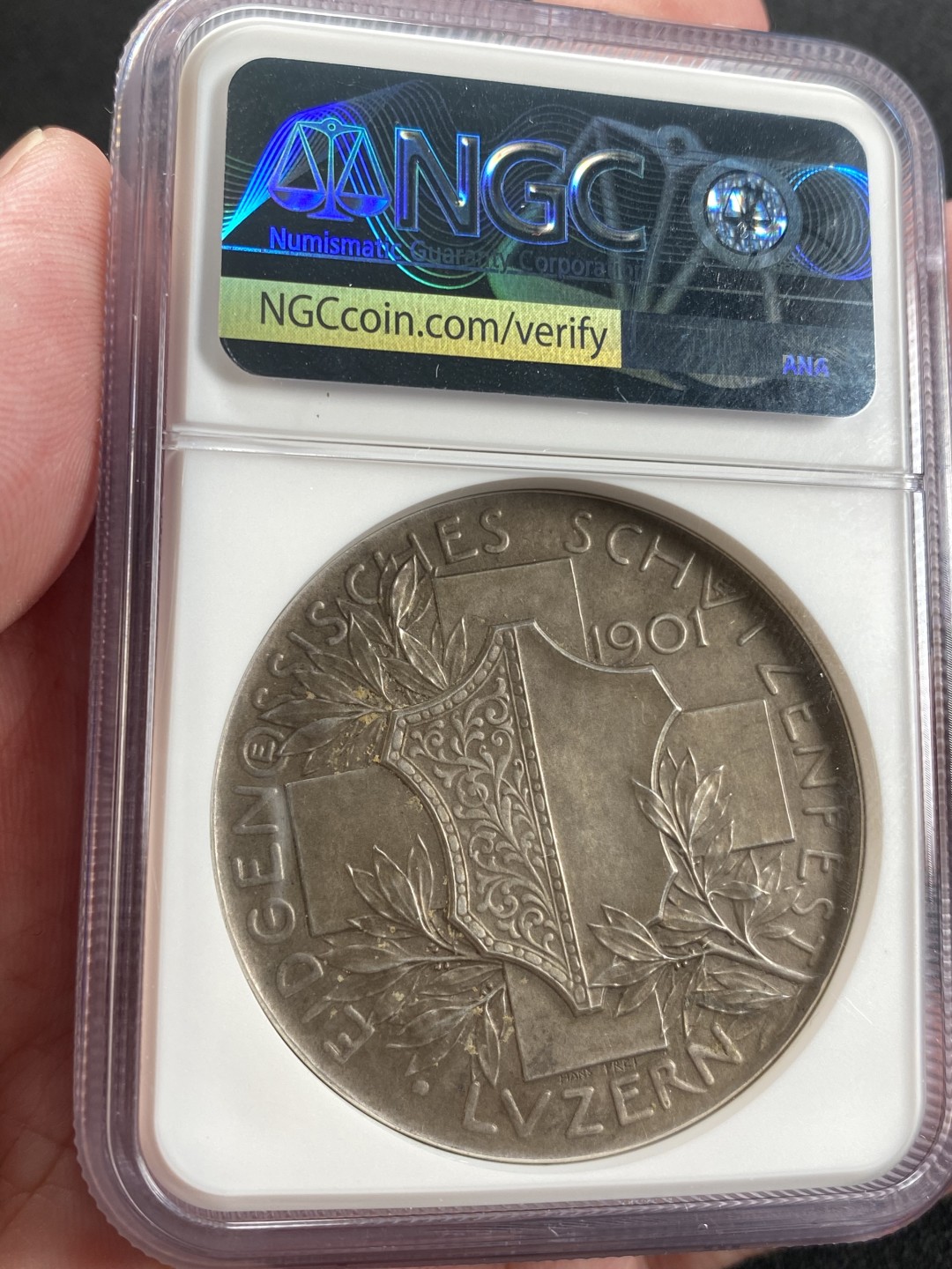 万国钱币拍卖第008期（慕尼黑2T之夜） NGC MS63 瑞士卢瑟恩射击节女神大银章，原味包浆精美高浮雕加厚盒。