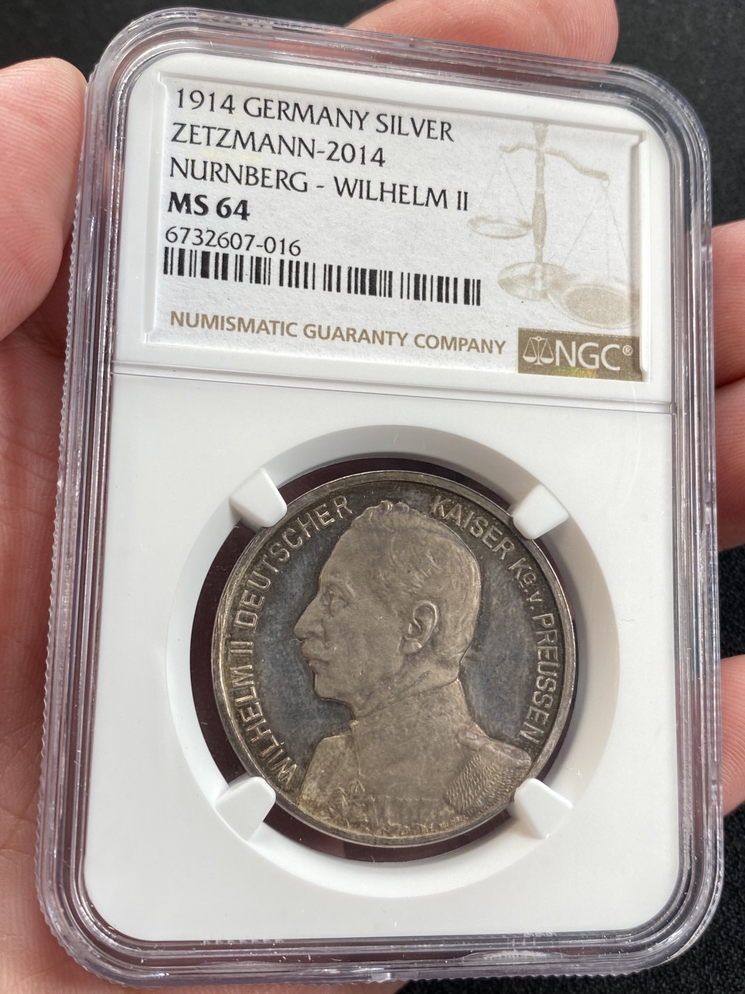 万国钱币拍卖第008期（慕尼黑2T之夜） NGC MS64 德国一战德皇威廉二世开战宣言纪念银章，镜面底板，紫色包浆难能可贵。