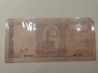 238.【鲸贝乐淘★两拍包邮】三字经·第“亲师友，习礼仪”号拍卖 【越南🇻🇳★解放区草纸币】1952年50盾，流通品相如图