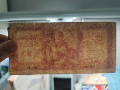 238.【鲸贝乐淘★两拍包邮】三字经·第“亲师友，习礼仪”号拍卖 【越南🇻🇳★解放区草纸币】1952年50盾，流通品相如图