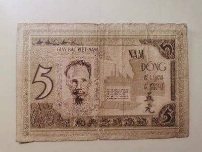 238.【鲸贝乐淘★两拍包邮】三字经·第“亲师友，习礼仪”号拍卖 【越南🇻🇳★解放区草纸币】1946年5盾，流通品相如图