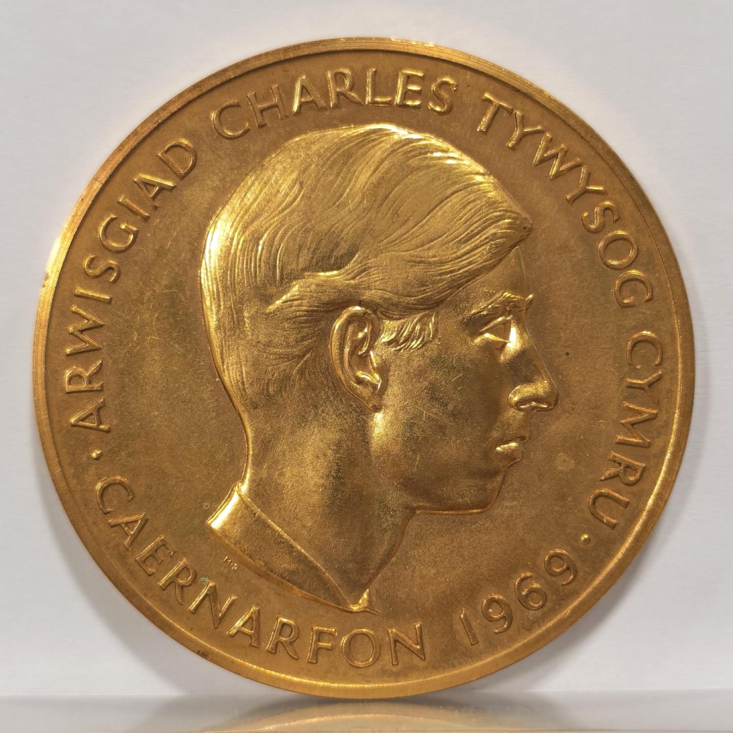 博洋堂马克藏家退坑小专场暨第026期（全场包邮） 英国1969年 查尔斯受封威尔士亲王大铜章(57MM)，正面查尔斯右侧像，背面是经典威尔士红龙图案，细节栩栩如生，实物非常漂亮，少见铜章值得收藏