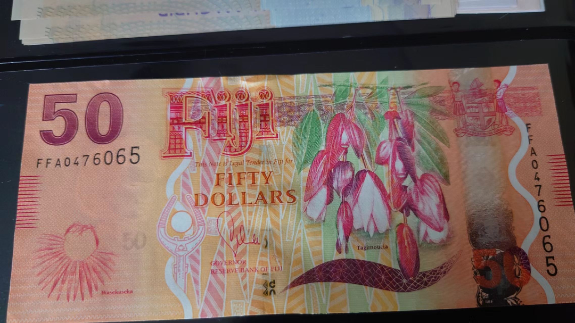 【世界钱币】精选微拍第62期暨2023年第九期 裸钞专场（有最新四月底币展卖剩品种） 2012年斐济50元 首发FFA冠 全新绝品尾号065