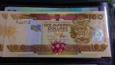 【世界钱币】精选微拍第62期暨2023年第九期 裸钞专场（有最新四月底币展卖剩品种） 2006年所罗门群岛100元 全程无4小号000712 全新绝品