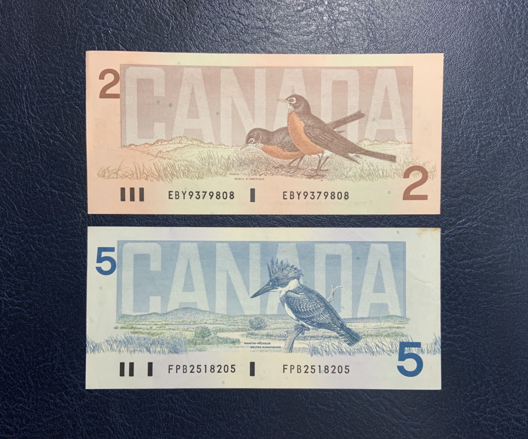 收藏联盟Quantum Auction 第258期拍卖  加拿大1986年2和5元 品相分别为UNC-和AU- 号码无4
