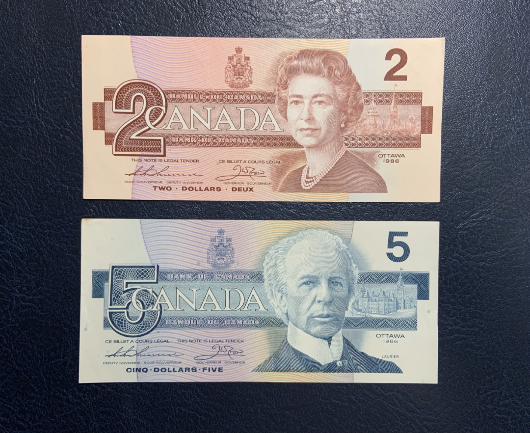 收藏联盟Quantum Auction 第258期拍卖  加拿大1986年2和5元 品相分别为UNC-和AU- 号码无4