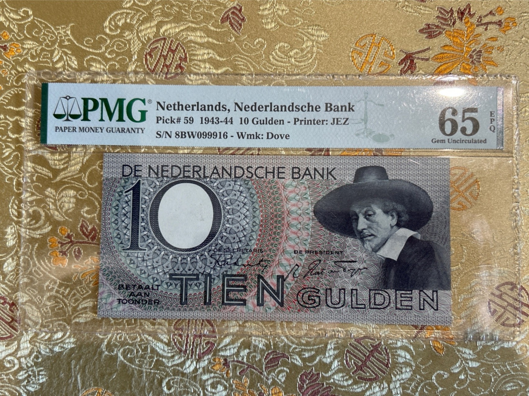 收藏联盟Quantum Auction 第259期拍卖 帝国余辉-印度新金山 荷兰1943-44年10盾 PMG65 倒置号 豹子身 伦勃朗名画《商会理事》