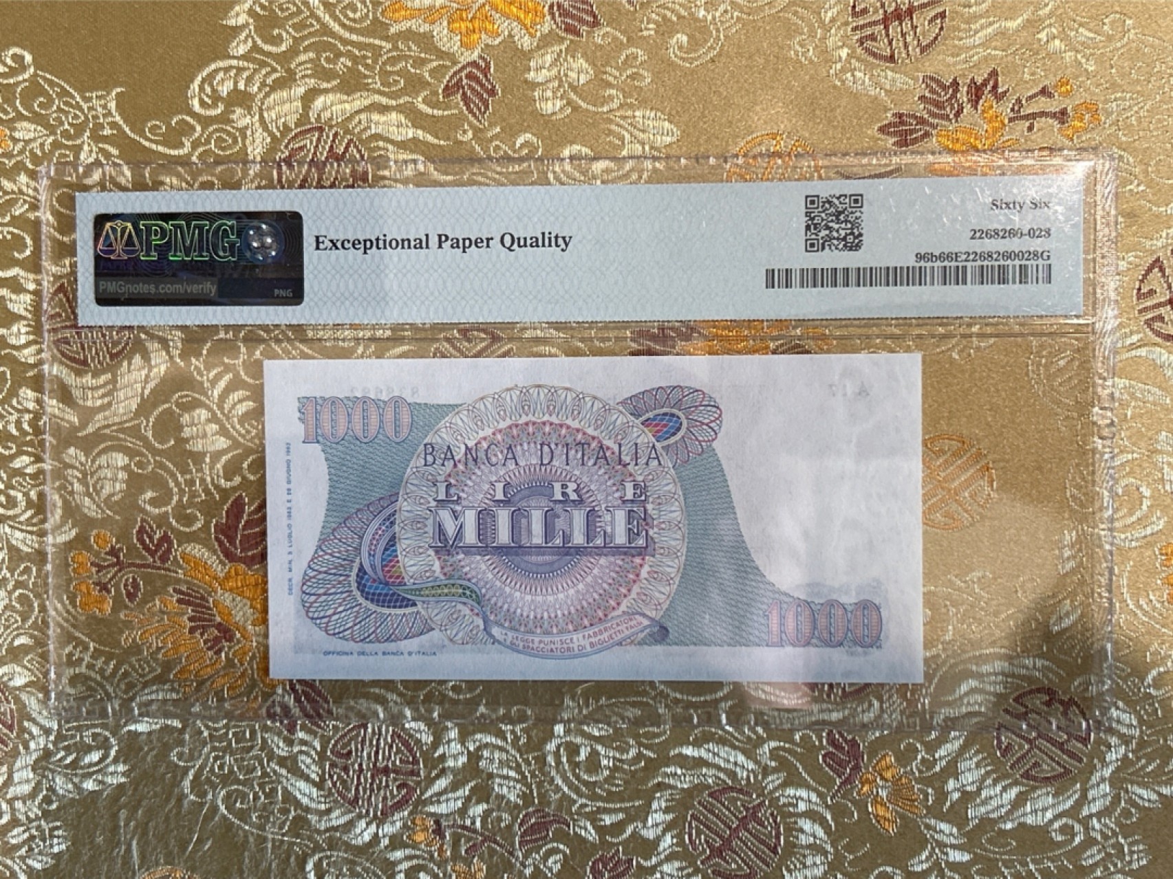 收藏联盟Quantum Auction 第259期拍卖 帝国余辉-印度新金山 意大利1963-64年1000里拉 PMG66 剧作家威尔第 号码无47