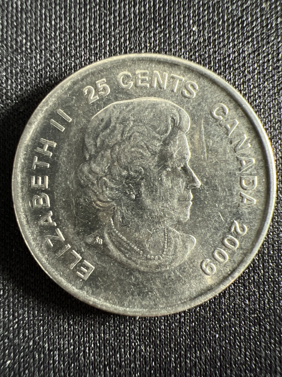 泡泡堂微拍第157幕硬币捡漏可累计专场👿👿，累计满二十元包邮，接受代拍业务 加拿大25分纪念币