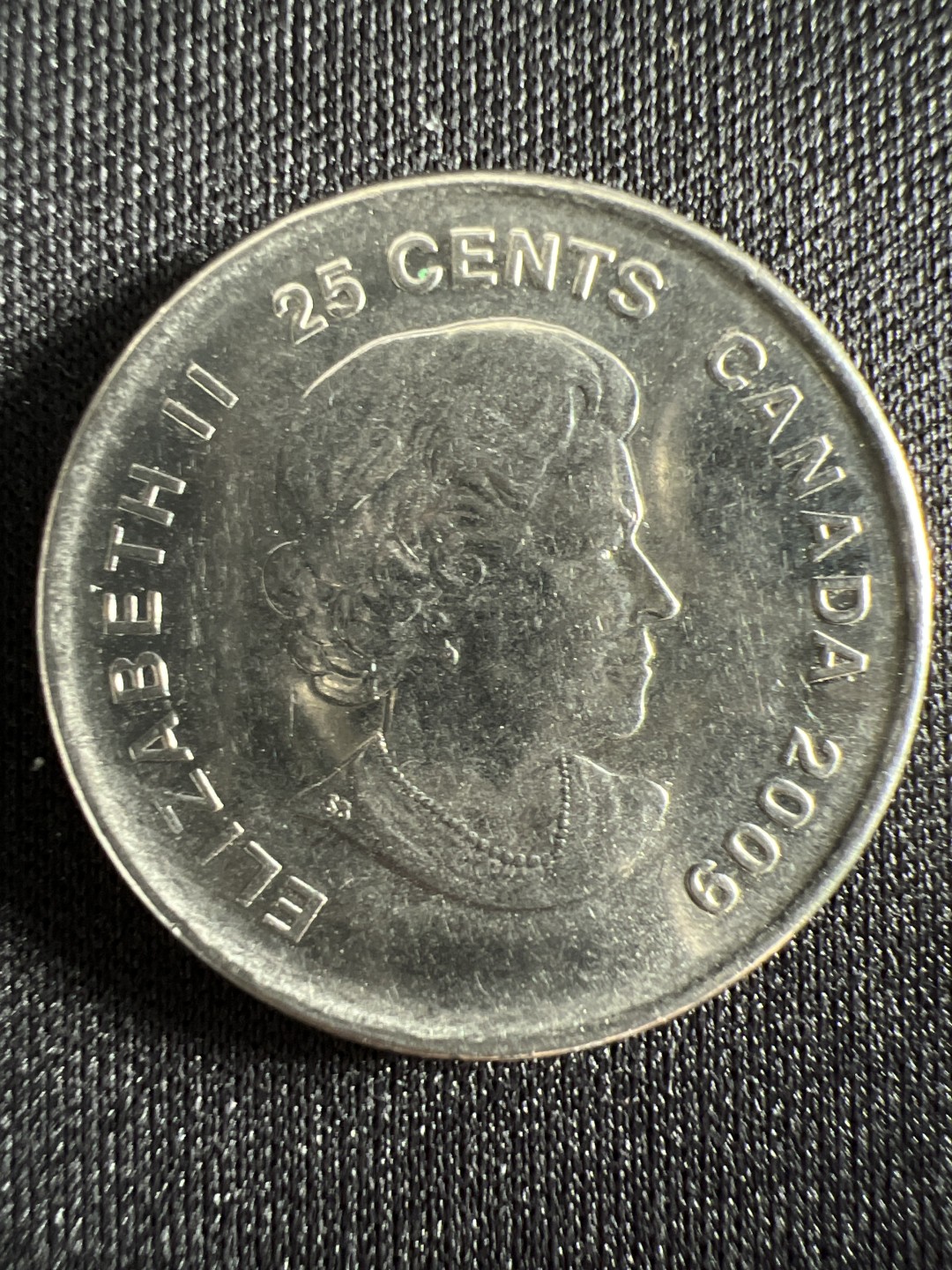 泡泡堂微拍第157幕硬币捡漏可累计专场👿👿，累计满二十元包邮，接受代拍业务 加拿大25分纪念币