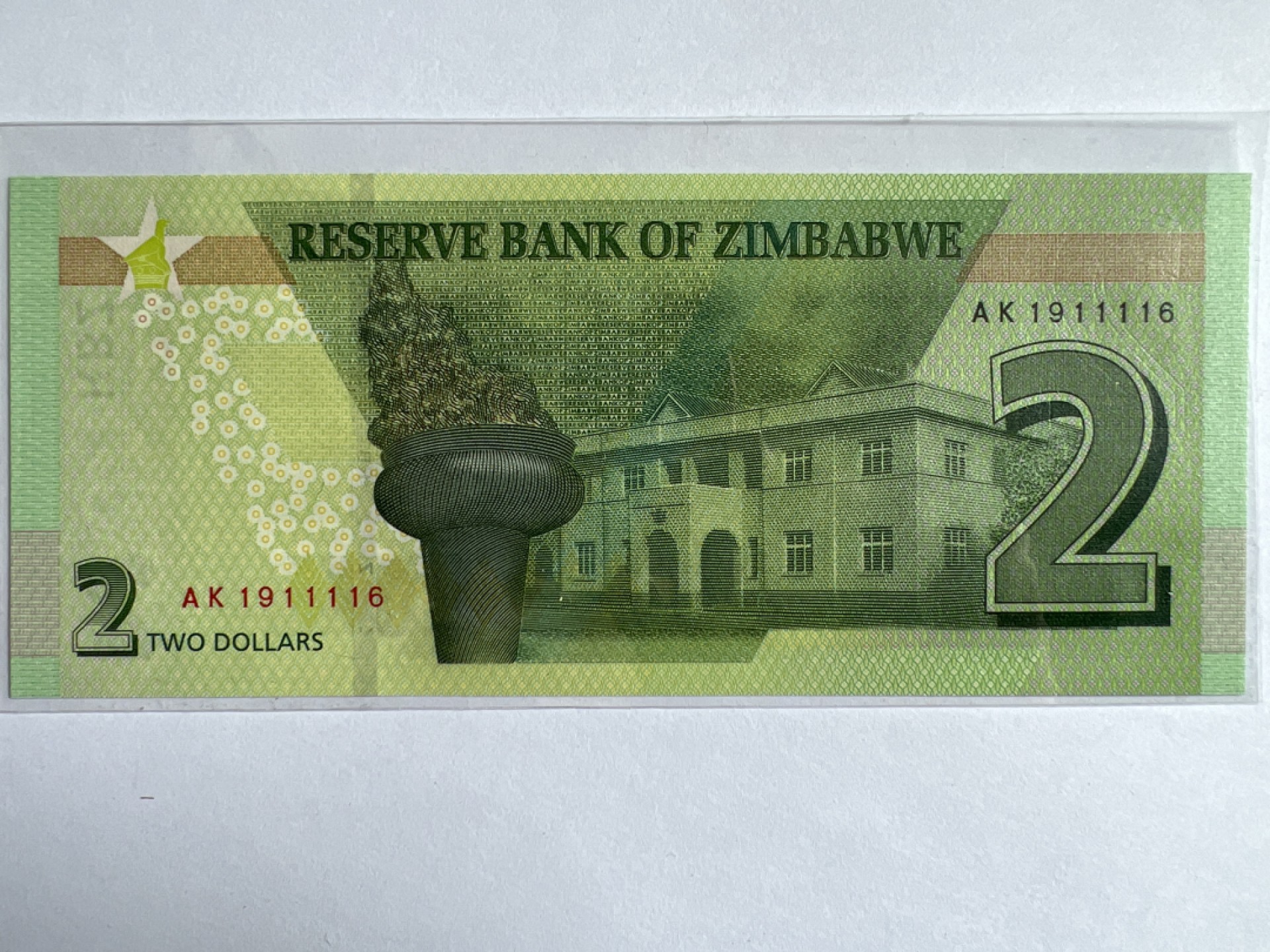 泡泡堂微拍第164幕纸币捡漏可累计专场👿👿，累计满二十元包邮，接受代拍业务 津巴布韦2元