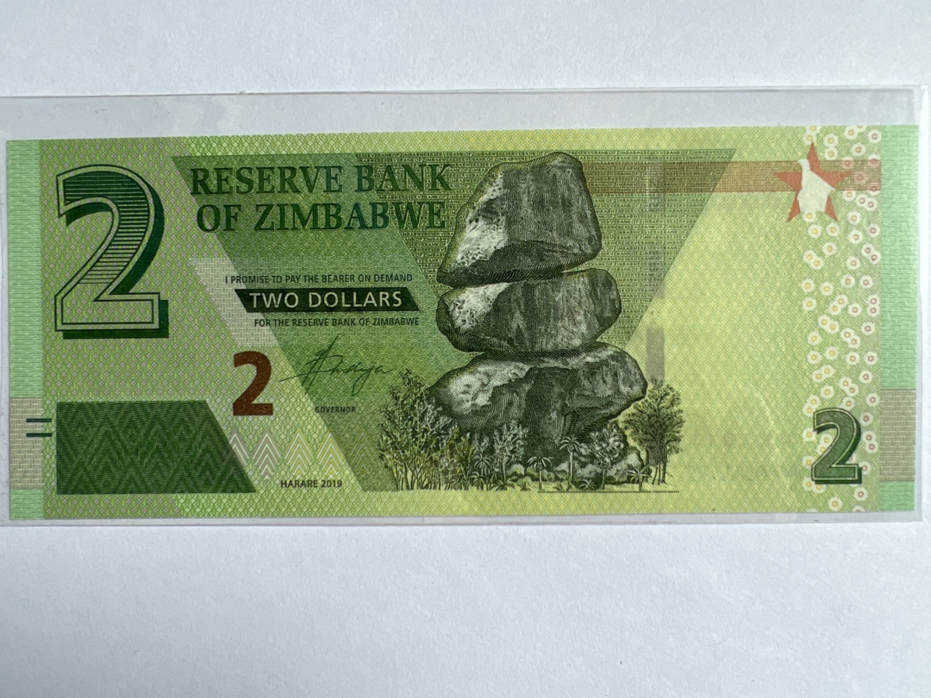 泡泡堂微拍第164幕纸币捡漏可累计专场👿👿，累计满二十元包邮，接受代拍业务 津巴布韦2元