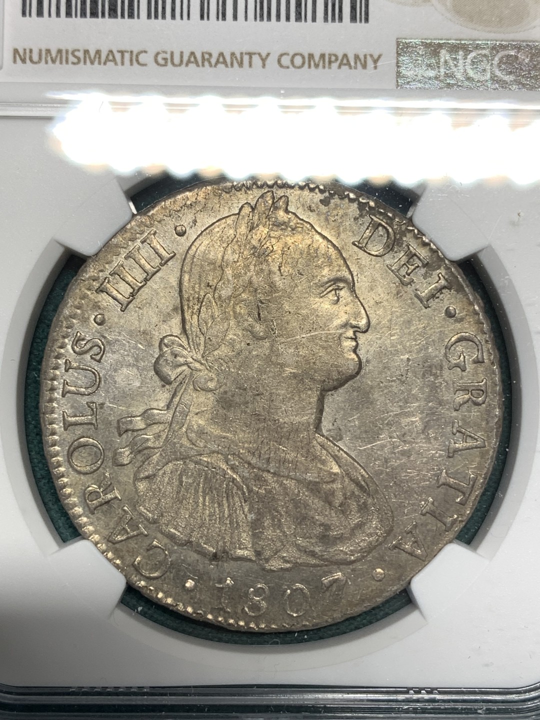 《竞宝斋》第167场-周日，周一，周四 3场 (全场包邮) NGC AU55 墨西哥 1807年 卡四 双柱 大银币 正反深打 底光充分很不错