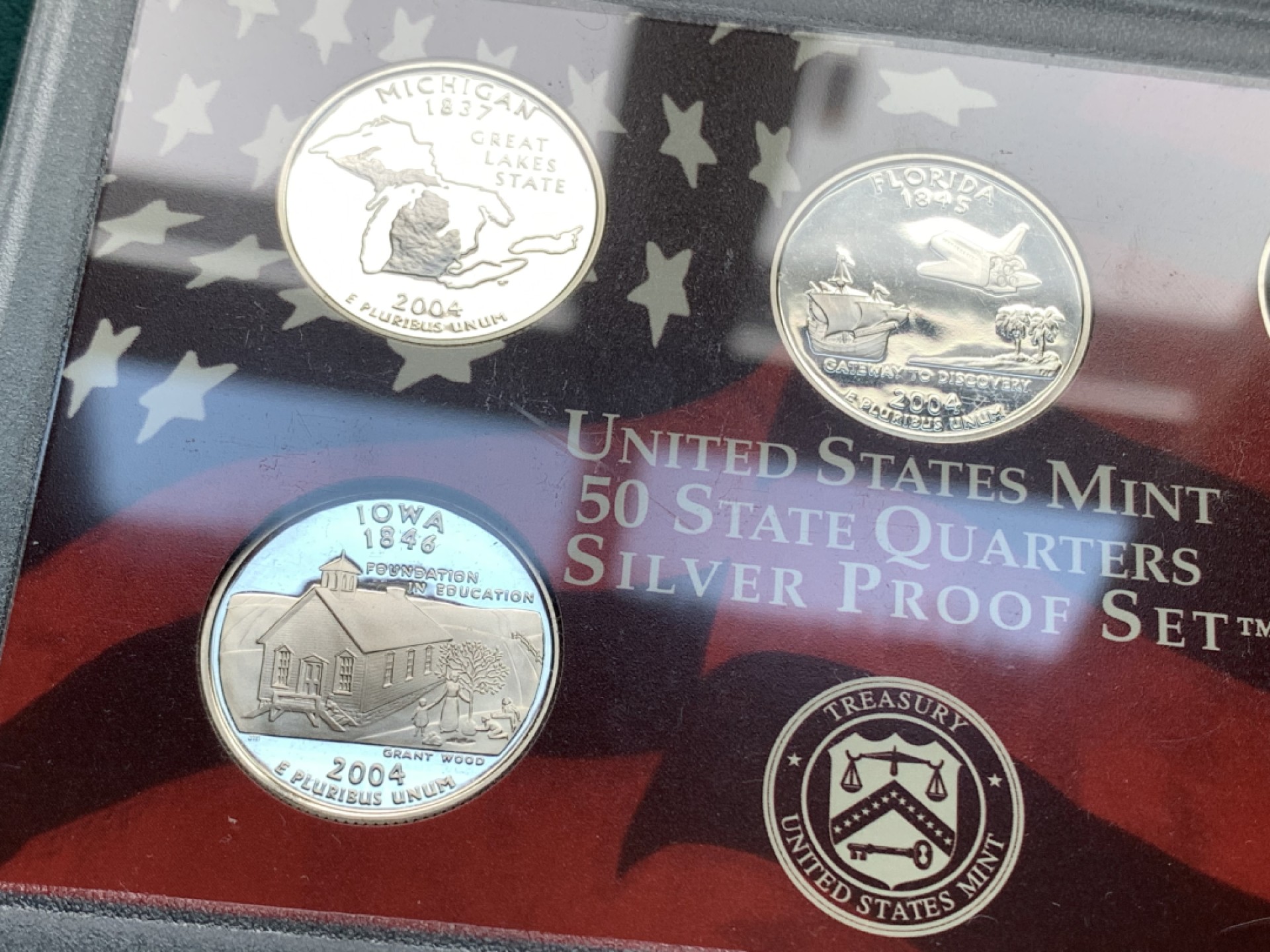 《竞宝斋》第167场-周日，周一，周四 3场 (全场包邮) 2004年美国精制银质套币，含1枚50美分，5枚25美分，1枚10美分共7枚银币