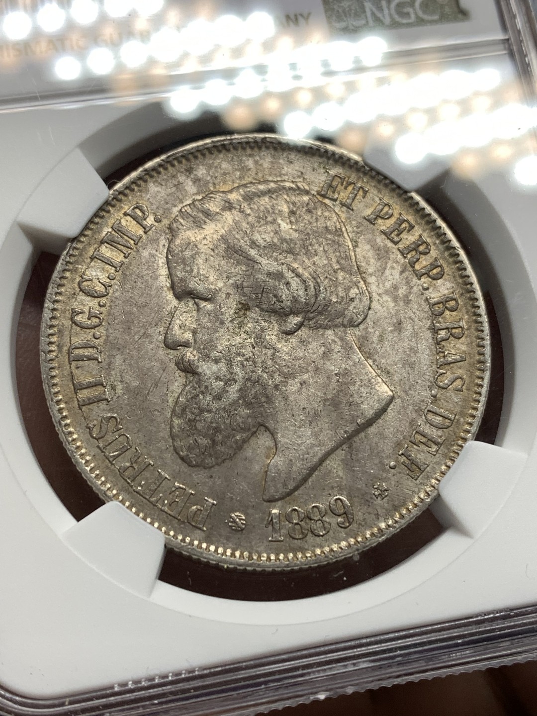 《竞宝斋》第167场-周日，周一，周四 3场 (全场包邮) NGC AU58 巴西 1889年 2000瑞斯 大银币 大胡子原味包浆 很不错