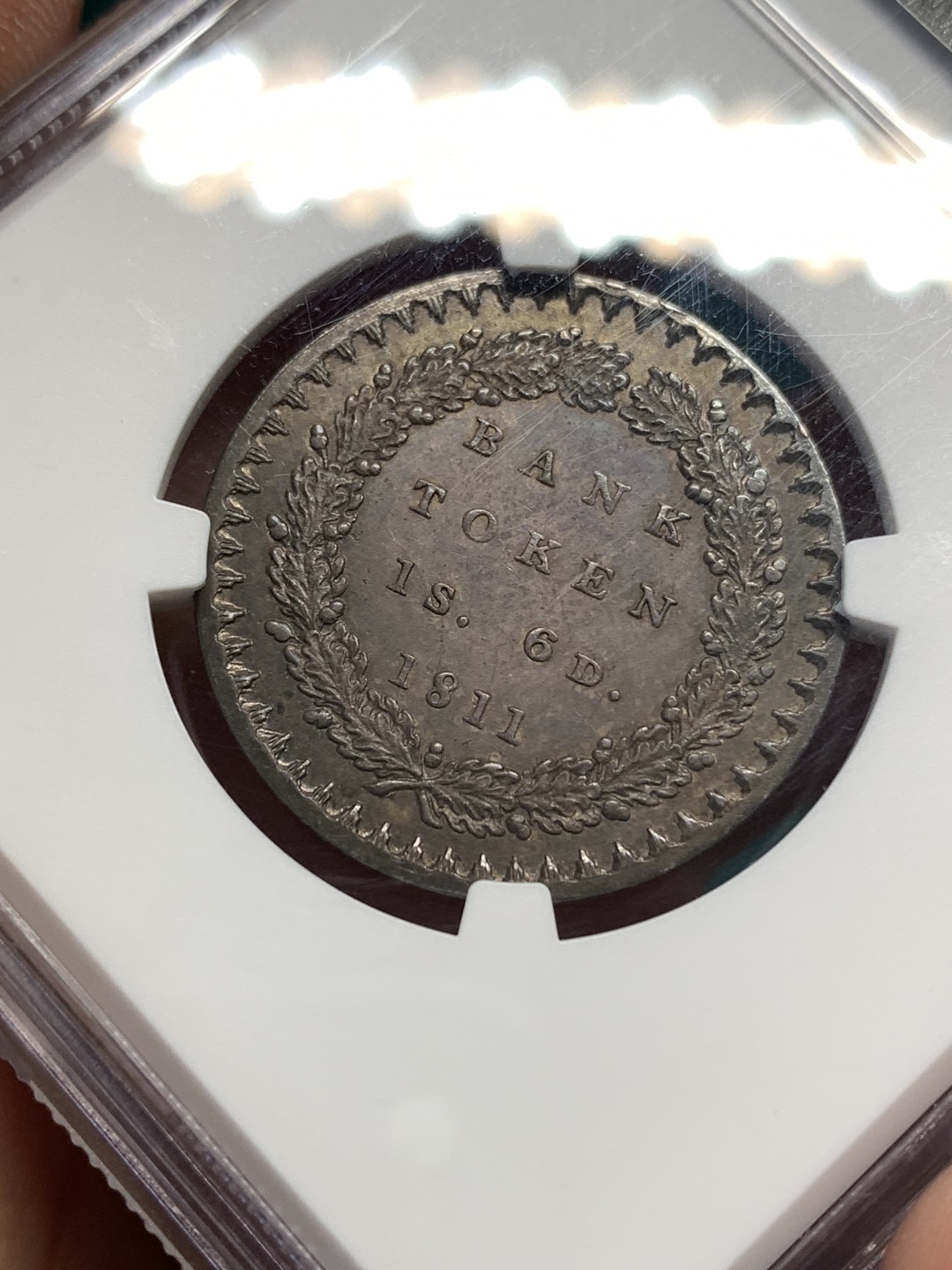 《竞宝斋》第167场-周日，周一，周四 3场 (全场包邮) NGC MS65 英国英格兰银行 1811年 乔治三世 1先令6便士（18便士）银行官方代币 双面紫罗兰包浆 高分难寻 收藏级品相