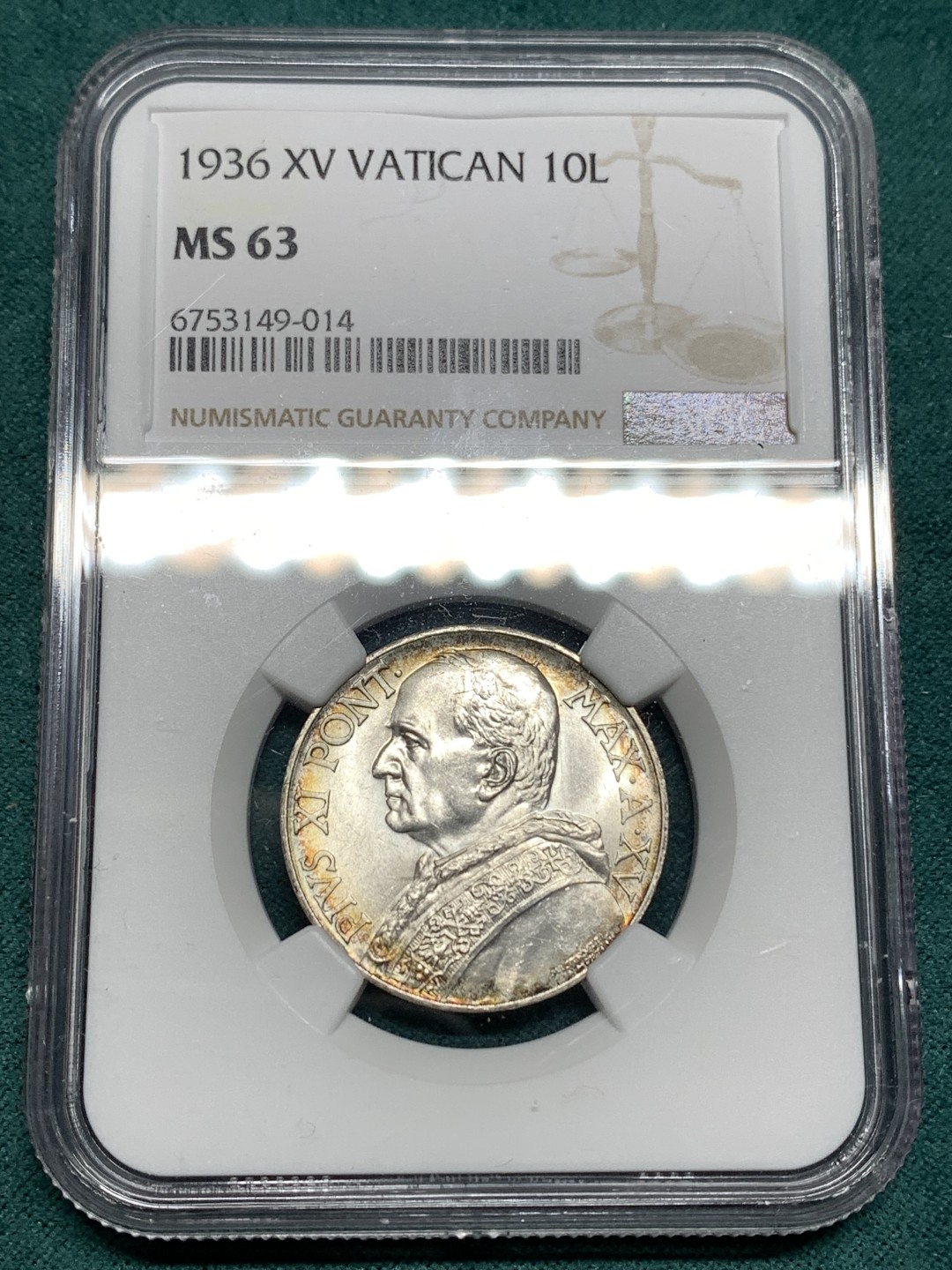《竞宝斋》第167场-周日，周一，周四 3场 (全场包邮) NGC MS63，梵蒂冈1936年10里拉。梵蒂冈主币，带少许环彩。年底上海评，给分略有保守