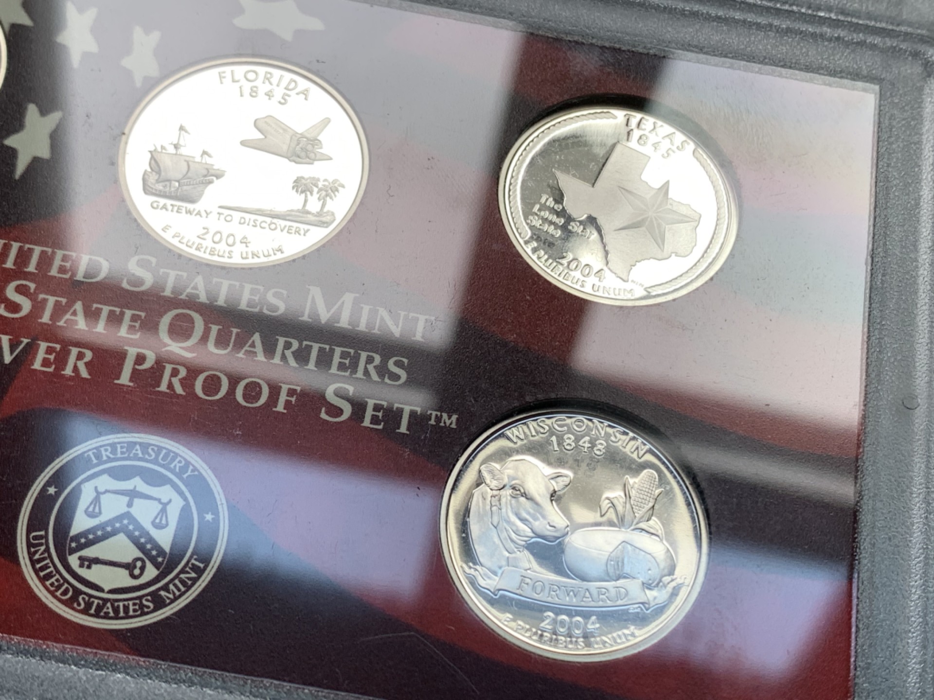 《竞宝斋》第167场-周日，周一，周四 3场 (全场包邮) 2004年美国精制银质套币，含1枚50美分，5枚25美分，1枚10美分共7枚银币