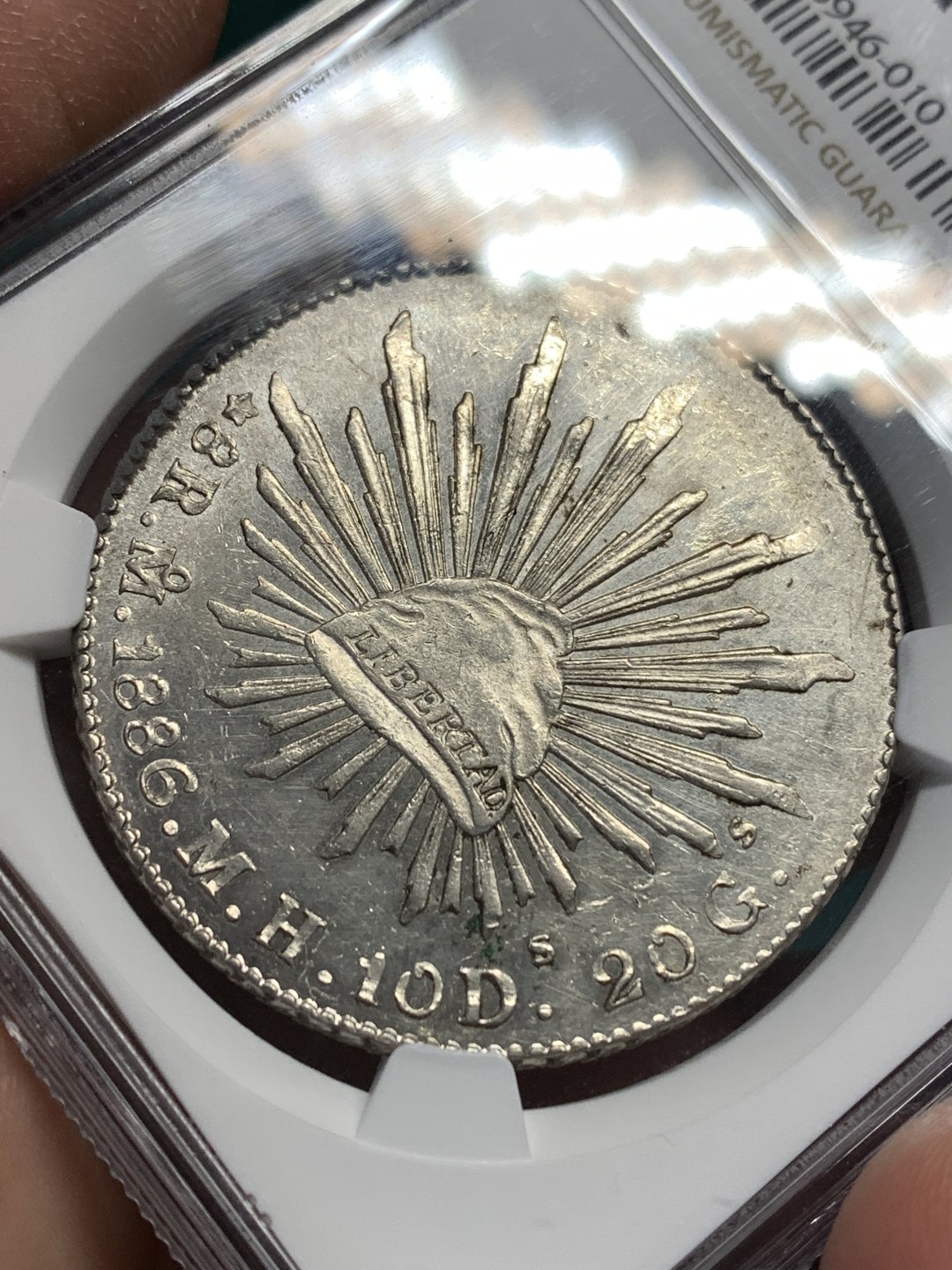 《竞宝斋》第167场-周日，周一，周四 3场 (全场包邮) NGC-MS61 墨西哥 1886 8瑞尔 花边鹰洋 银币 底板很不错 光度很足