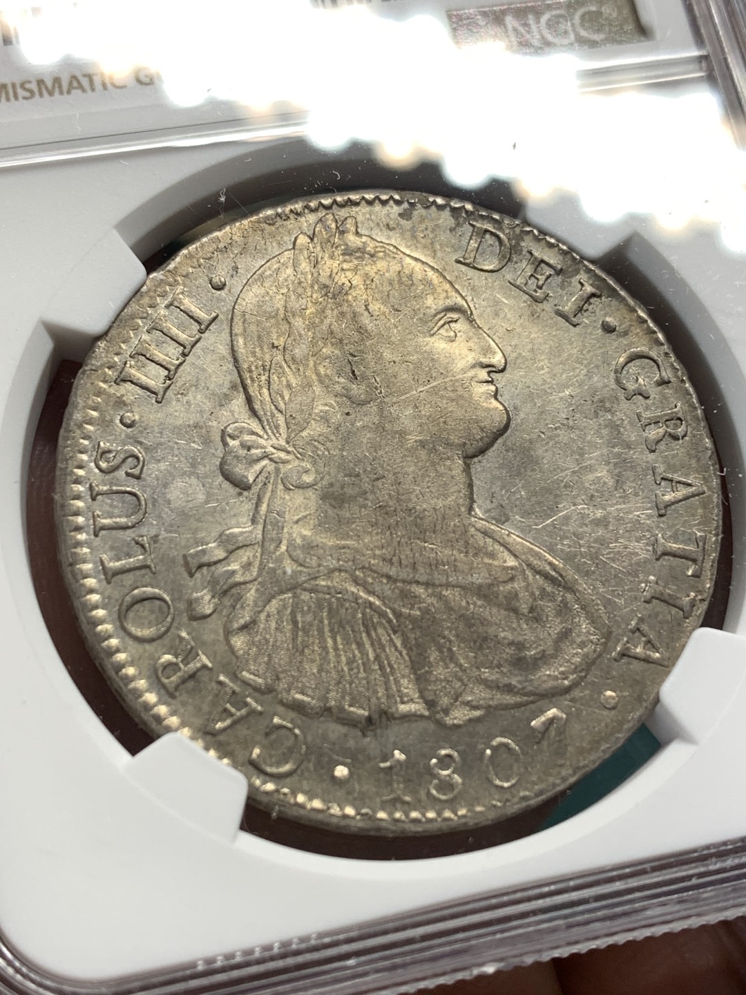 《竞宝斋》第167场-周日，周一，周四 3场 (全场包邮) NGC AU55 墨西哥 1807年 卡四 双柱 大银币 正反深打 底光充分很不错