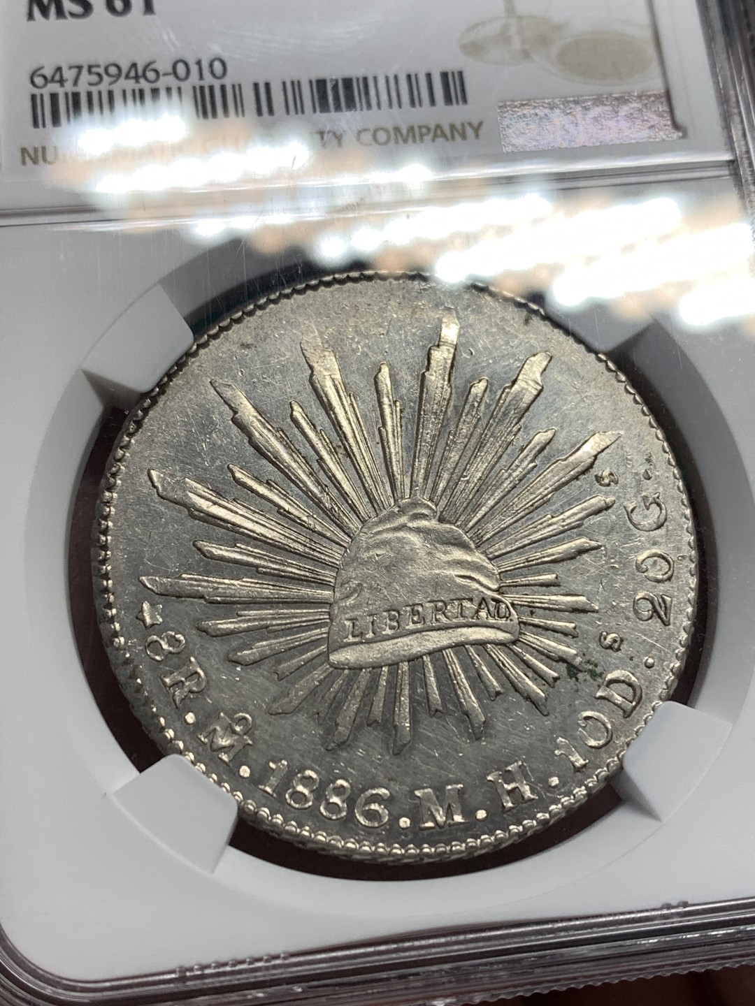 《竞宝斋》第167场-周日，周一，周四 3场 (全场包邮) NGC-MS61 墨西哥 1886 8瑞尔 花边鹰洋 银币 底板很不错 光度很足