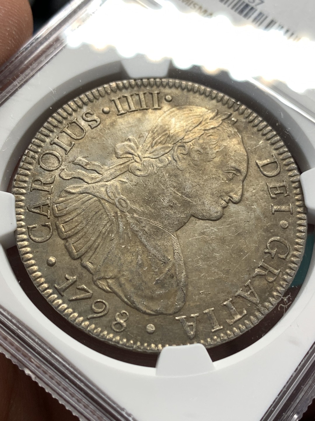 《竞宝斋》第167场-周日，周一，周四 3场 (全场包邮) NGC UNC  墨西哥 1798年 早期卡四 双柱 大银币 正反深打背面底板极好 感觉可以再试试