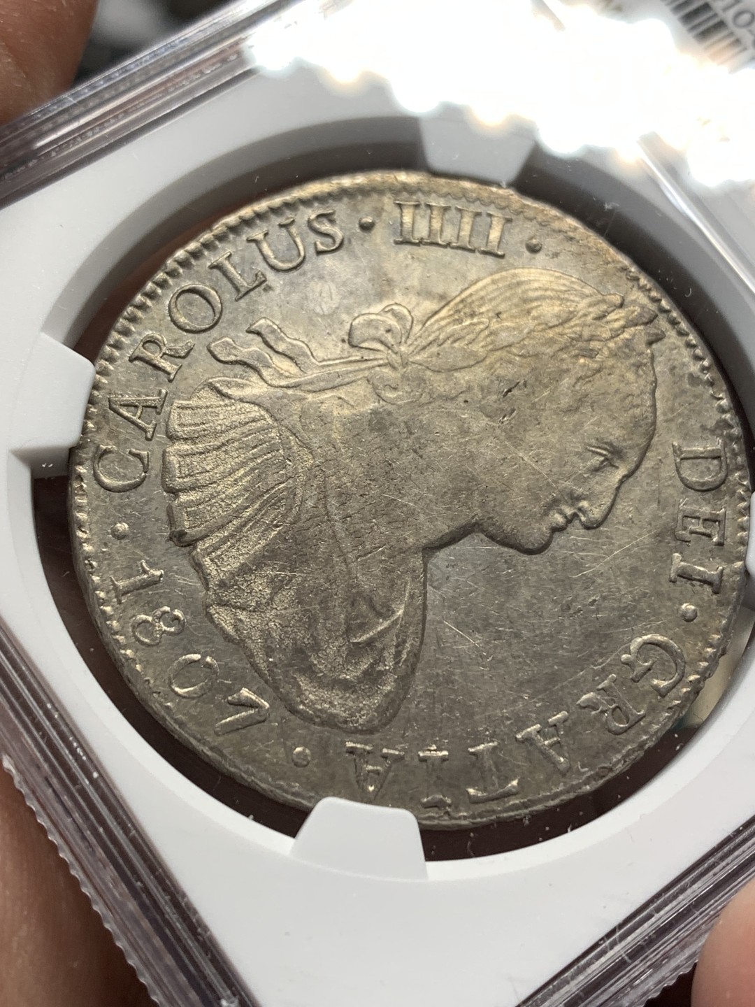 《竞宝斋》第167场-周日，周一，周四 3场 (全场包邮) NGC AU55 墨西哥 1807年 卡四 双柱 大银币 正反深打 底光充分很不错