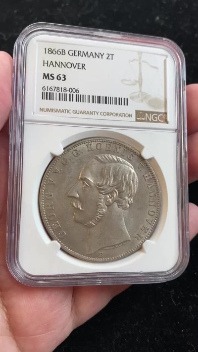 万国钱币拍卖第009期（万国白金之夜） NGC MS63 1866德国汉诺威狮马2泰勒，狮马2t中发行量最少的一个年份，仅三万多枚。