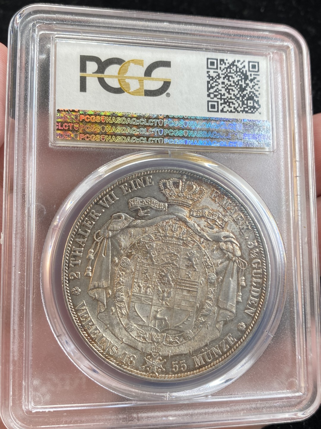 万国钱币拍卖第009期（万国白金之夜） PCGS MS64 1855B德国布伦瑞克纹章2泰勒，黄油转光，底板整洁无伤，对2泰勒这样的币幅来说相当不容易了，非常到位的状态。（此枚PCGS官图有误）