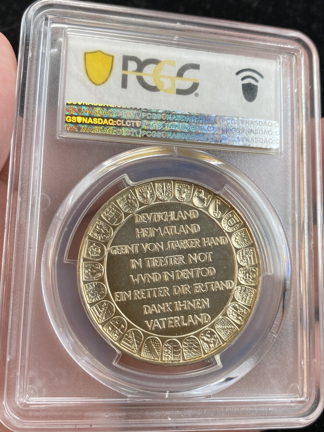 万国钱币拍卖第009期（万国白金之夜） PCGS SP66 1930年魏玛共和国银章开辟者俾斯麦与守卫者兴登堡，背面25个邦徽细节完美，顶级品相，PCGS冠军分，双面高闪金色包浆，一步到位的收藏。