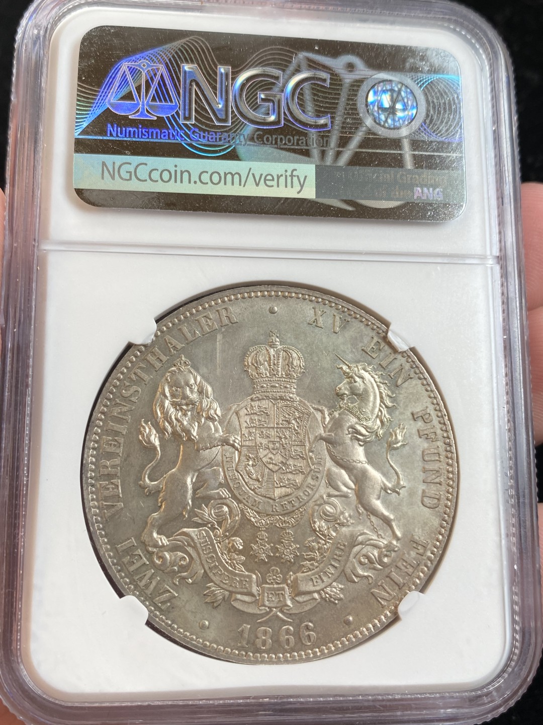 万国钱币拍卖第009期（万国白金之夜） NGC MS63 1866德国汉诺威狮马2泰勒，狮马2t中发行量最少的一个年份，仅三万多枚。