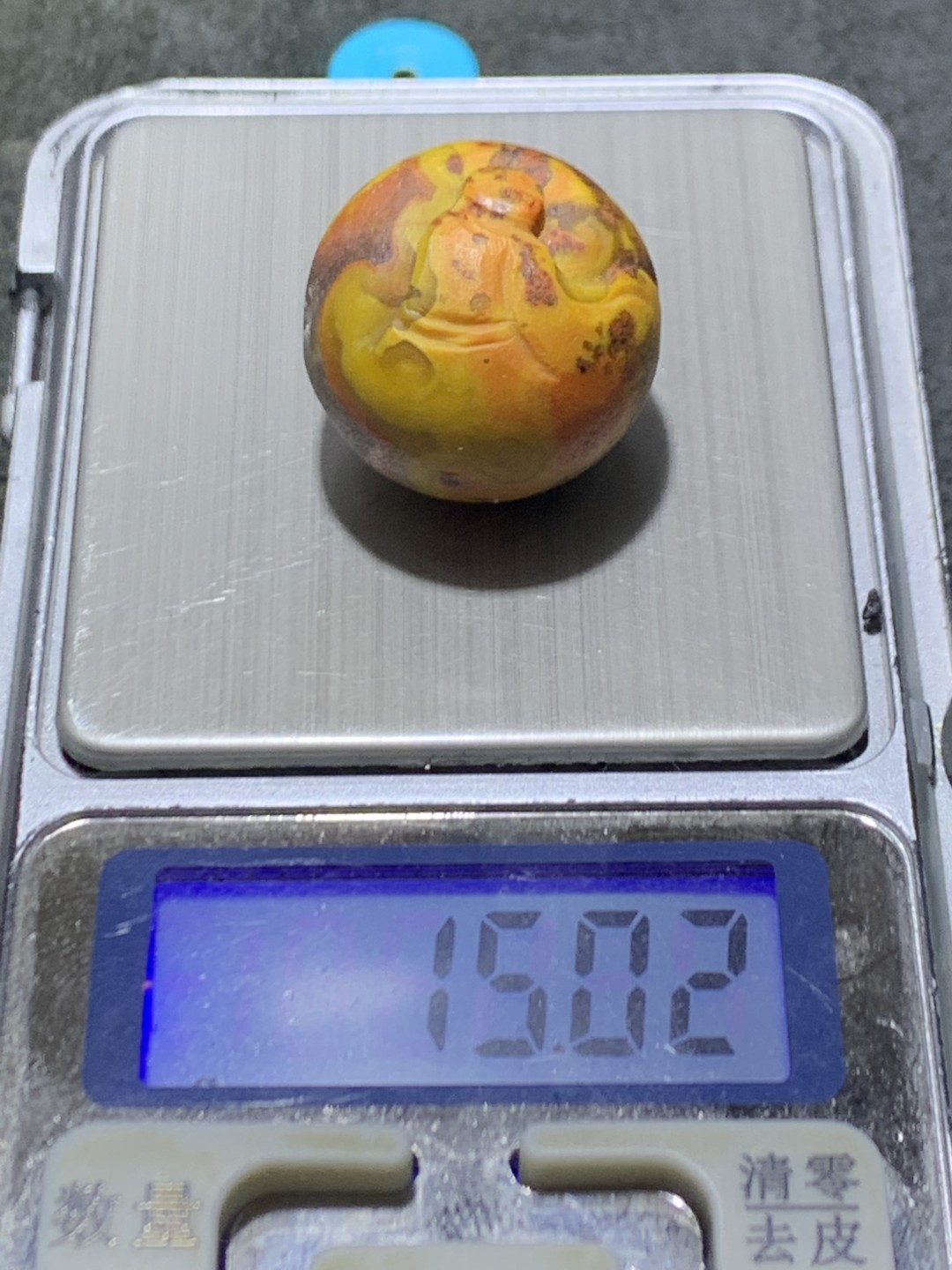 精美冰飘草花纹战国红玛瑙手工俏色巧雕无相佛意境珠一颗！