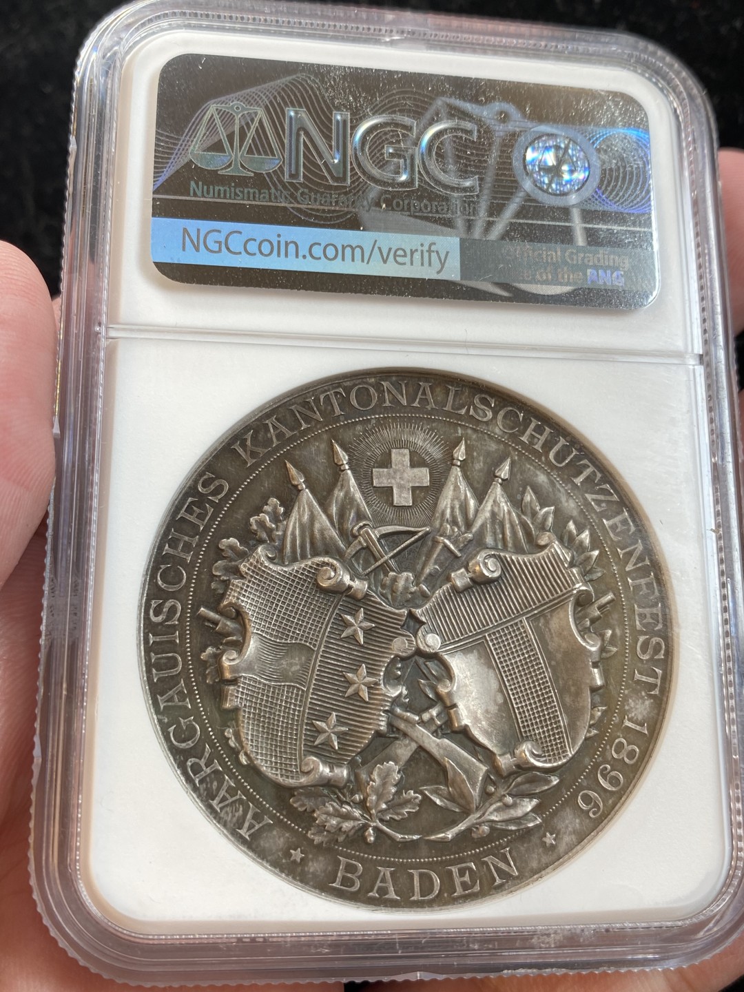 万国钱币拍卖第009期（万国白金之夜） NGC MS64 1896瑞士阿尔高-巴登射击节大银章，顶级品相，镜面高浮雕，原味包浆。