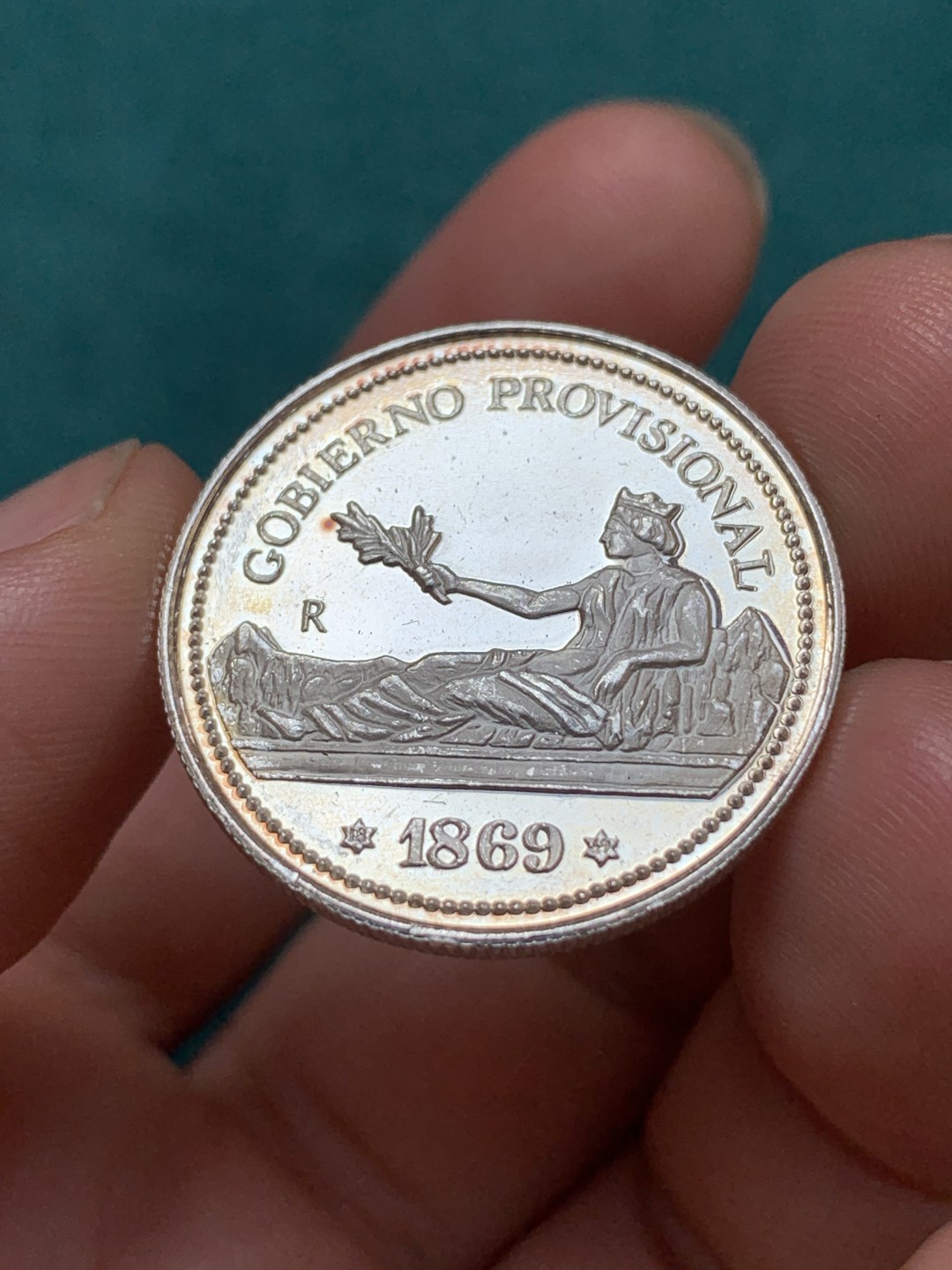 《竞宝斋》第169场-周日，周一2场 (全场包邮) 西班牙 拿花银章 999银 少见品种 PF状态 9.15克 999银