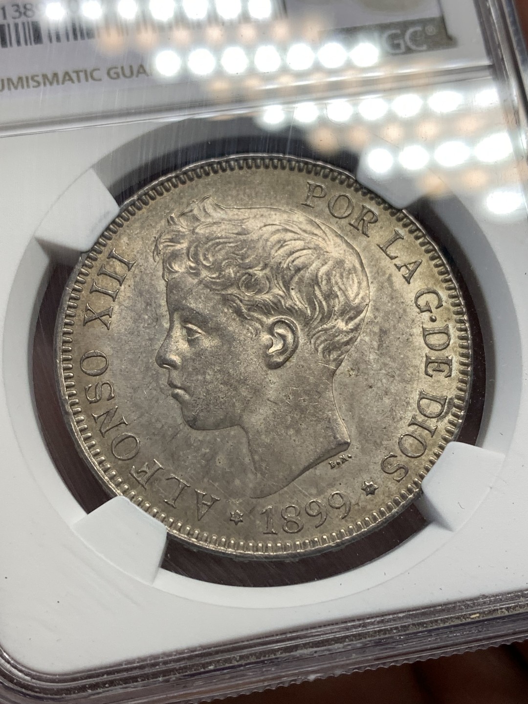 《竞宝斋》第169场-周日，周一2场 (全场包邮) NGC-UNC 西班牙1899年 阿方索十三世 5比塞塔双柱银币 顶级原光好品 可以重评